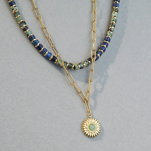 Layered turquoise beaded necklace with gold sun flower pendant and paperclip chain