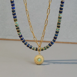 Layered turquoise beaded necklace with golden flower pendant on titanium steel chain