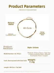 Detail view of tiger eye stone and freshwater pearl necklace with 18k gold plating