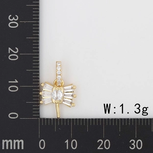 Detail of cubic zirconia bow pendant showing dimensions and 1.3g weight on measurement mat