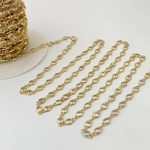 Detail showing gold DIY chain with 4mm round cubic zirconia settings for jewelry making