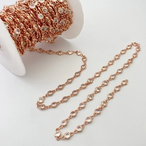 Detail view of 4mm zircon bead chain in rose gold finish for DIY jewelry crafting
