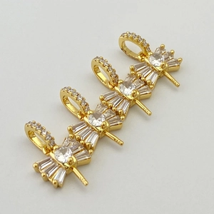 Set of four gold-plated bow jewelry clasps with micro-paved zircons and pins for pearls