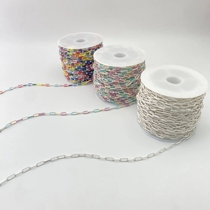 Colorful paperclip link chains on spools for DIY jewelry making and handmade necklaces