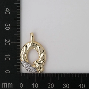 Detailed measurement of Q-shaped pendant with hammered gold texture and pave zircons