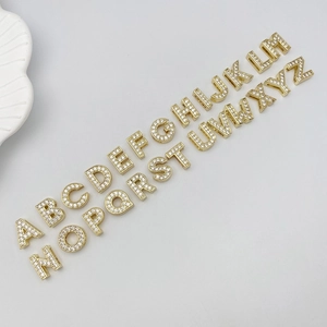 Full set of 26 alphabet charms in gold finish with white zircon for DIY jewelry making