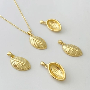 Polished gold football pendant necklace with realistic stitched texture and fine chain