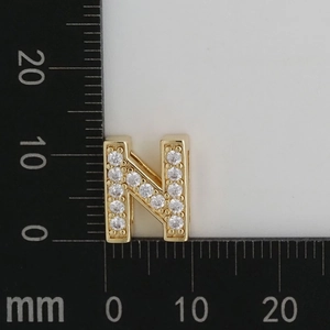 Macro size reference for gold micro-pave letter N charm with white cubic zirconia