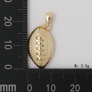 Detail view of gold football pendant with textured surface showing 2.5g weight and 20mm size