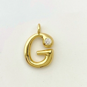 Polished gold letter G pendant necklace with a brilliant round zircon stone accent