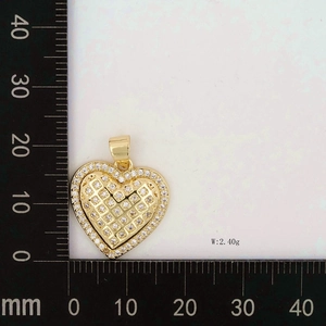 Detailed size measurement of a gold heart pendant with cubic zirconia and 2.40g weight