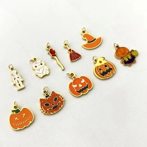 Set of 10 Halloween metal charms featuring pumpkins, skeletons and wizard hats for jewelry