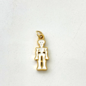 Detailed macro view of a minimalist white enamel ghost pendant with a golden metal outline