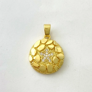 Macro view of 18K gold plated coin pendant with zircon star and nugget texture