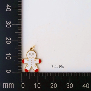 Gingerbread man Christmas pendant in white enamel with gold trim, weight 1.10g, 18mm height
