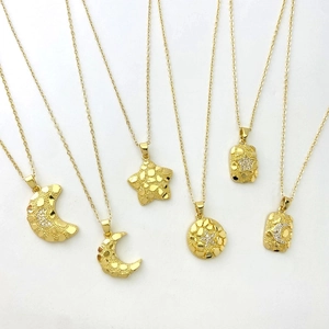 Micro-pave zircon moon and star necklaces in 18K gold-plated textured metal finish