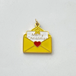 Detail of Christmas envelope pendant with red heart and Merry Christmas engraving