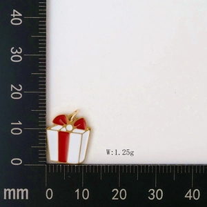 Detail of red and white enamel gift box pendant with metal loop measuring 12mm wide