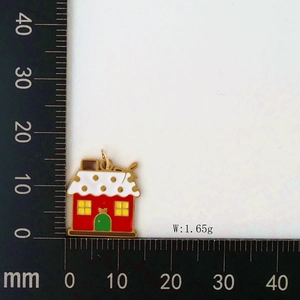 Detail showing dimensions of red Christmas house pendant with white snow and green door
