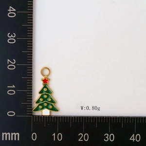 Detail showing dimensions of green Christmas tree pendant with scale and weight info