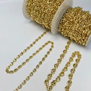 Bulk gold mariner pig nose chain links on white spools for DIY jewelry making