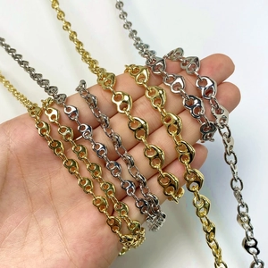 DIY jewelry making supplies featuring gold and silver pig nose link chains in metal