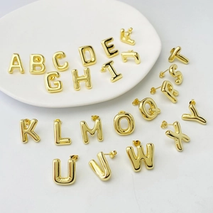 Golden 26 alphabet puffy stud earrings set with minimalist 3D metal letters design