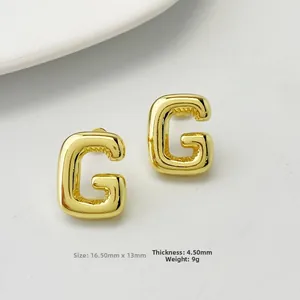 Polished golden letter G stud earrings with 3D balloon design and 16.5mm size details
