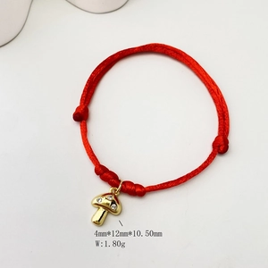 Detail showing dimensions of red cord bracelet with gold mushroom pendant and zircons