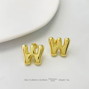 Detailed view of gold puff balloon style 'W' initial stud earring showing 16.8mm dimensions