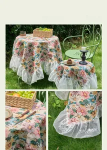 Close-up of vintage jacquard tablecloth featuring colorful floral patterns and white lace edges