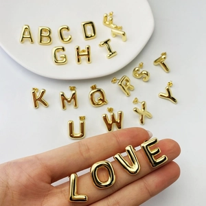 Minimalist gold-plated alphabet stud earrings set with polished 26 A-Z letter design