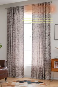 Detailed relief texture of brown jacquard curtains with vintage floral patterns