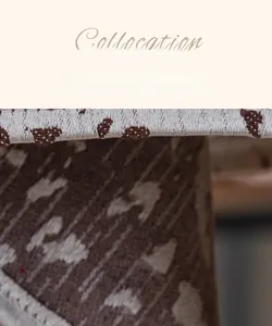 Macro detail of Nordic jacquard fabric with thickened double-sided weave in brown and cream