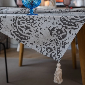 Nordic gray jacquard tablecloth with abstract patterns and decorative corner tassels