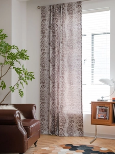 Detailed texture of beige Nordic curtains featuring vintage brown damascus floral patterns