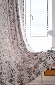 Close-up of Nordic brown damascus jacquard curtain fabric with retro textured floral patterns