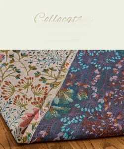 Macro view of double-sided jacquard fabric with floral patterns and fringe details