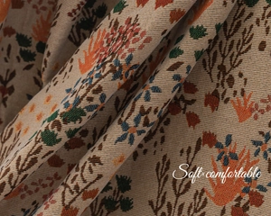 Close-up of Bohemian jacquard curtain fabric with retro forest botanical patterns