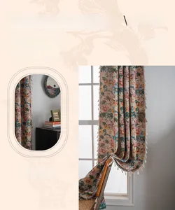 Detailed view of floral embroidery and tassel fringe on polyester curtain fabric
