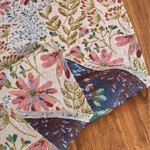 French country style table runner with pink jacquard floral patterns and tassel trim