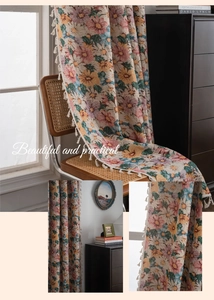 Close-up of floral jacquard fabric with tassels showing texture and pattern details