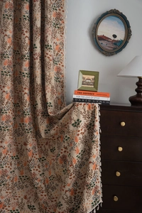 Detail view of Bohemian floral jacquard curtains with tassels and retro botanical patterns