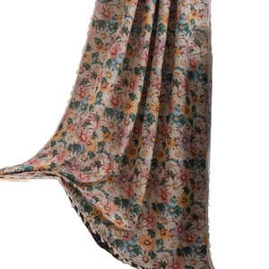 Floral curtains with colorful daisy pattern and decorative tassels for living room decor