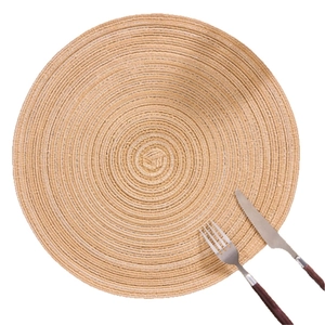 Nordic round woven heat-resistant cotton placemat with cutlery set on white background