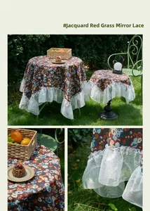 Detail of red floral jacquard tablecloth with elegant white lace ruffle edges and patterns