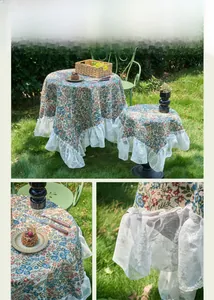 Macro detail of blue floral jacquard fabric with elegant white lace ruffled edges