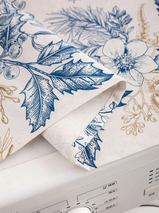 Close-up of elegant blue floral pattern on durable linen fabric refrigerator cover