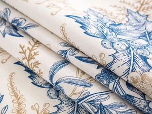 Detailed macro view of linen texture with blue berry floral pattern on fridge cover
