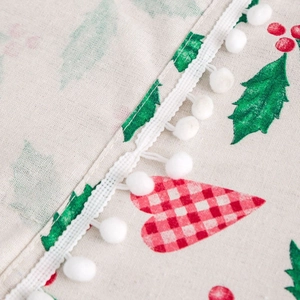 Christmas refrigerator cover with festive red heart and white pom-pom trim detail